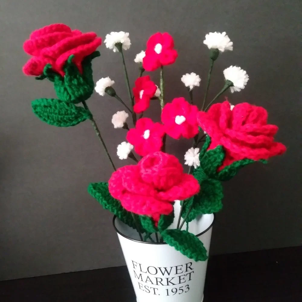 Handmade crochet bouquet of red roses,